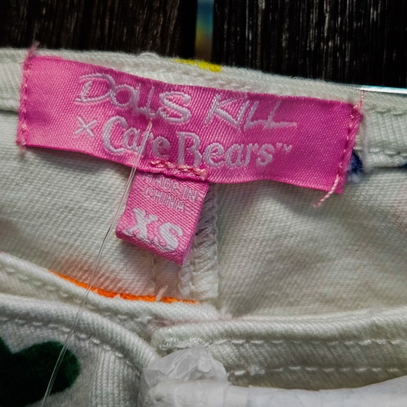NWT CHEERING FOR YOU FLARE PANTS DOLLS KILL X CARE BEARS - Picture 3 of 7